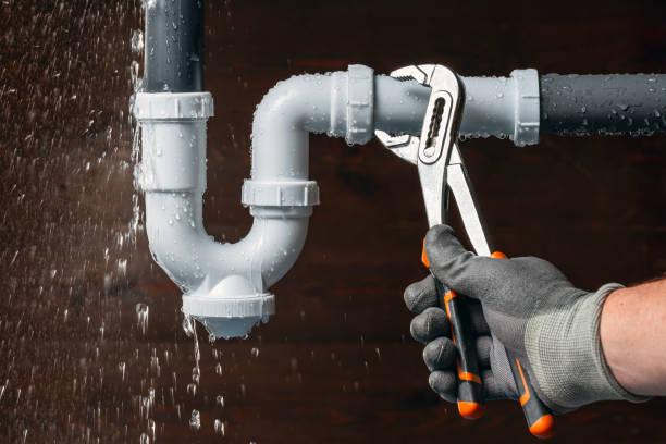 Professional Drain Cleaning technician working in Milan, MO